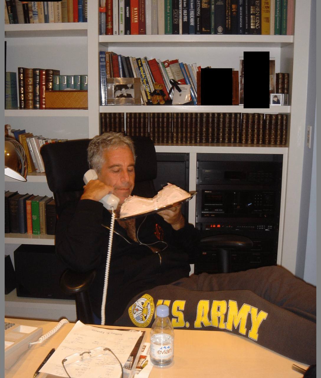 Epstein eating cake with Talmud behind him